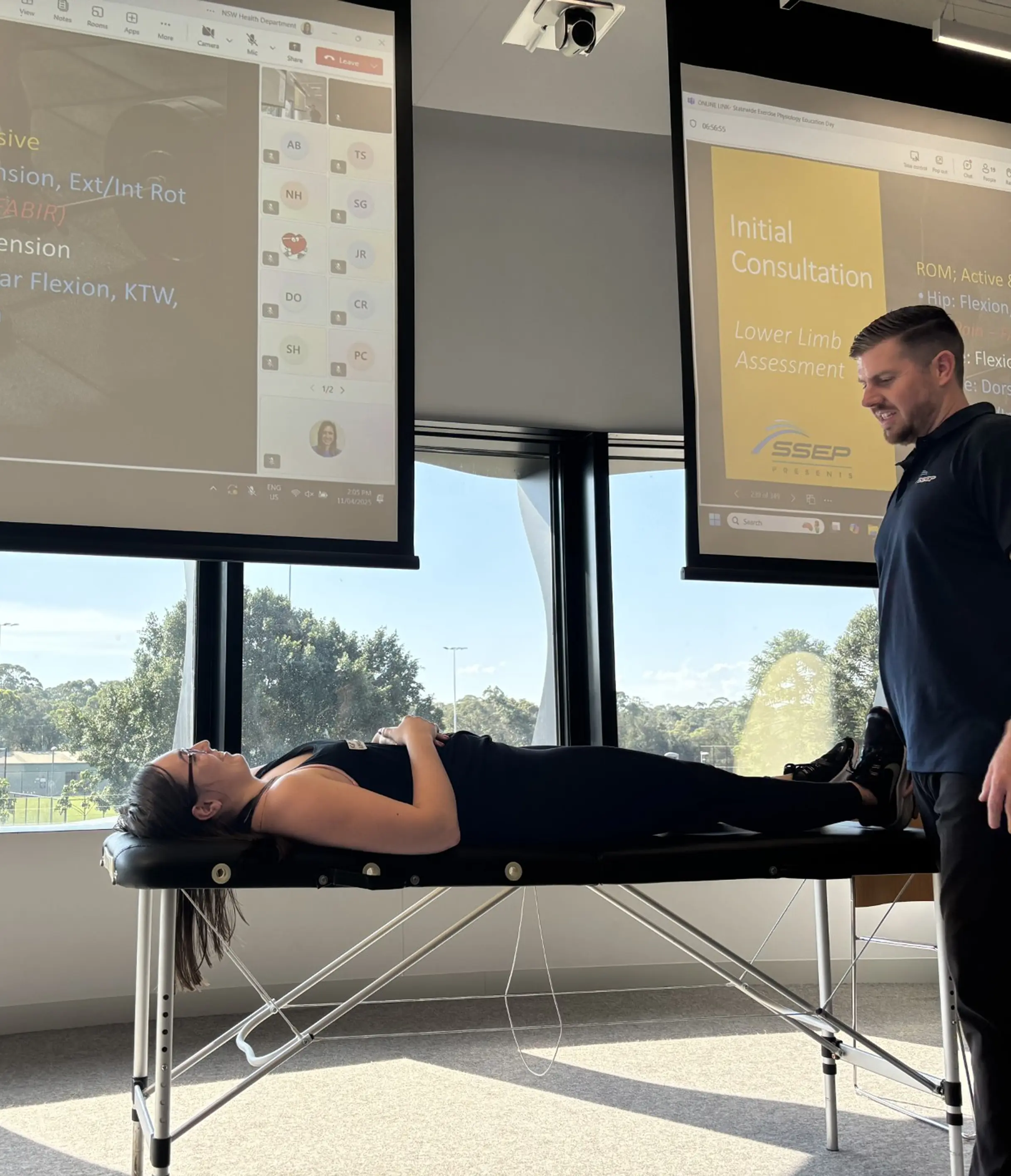 Exercise physiologist working with a patient during a workshop